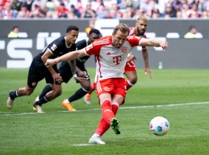 27 April 2024, Bavaria, Munich: Soccer: Bundesliga, Bayern Munich - Eintracht Frankfurt, matchday 31 at the Allianz Arena. Muniches Harry Kane scores from the penalty spot to make it 2-1. Photo: Sven Hoppe/dpa - IMPORTANT NOTE: In accordance with the regulations of the DFL German Football League and the DFB German Football Association, it is prohibited to utilize or have utilized photographs taken in the stadium and/or of the match in the form of sequential images and/or video-like photo series.