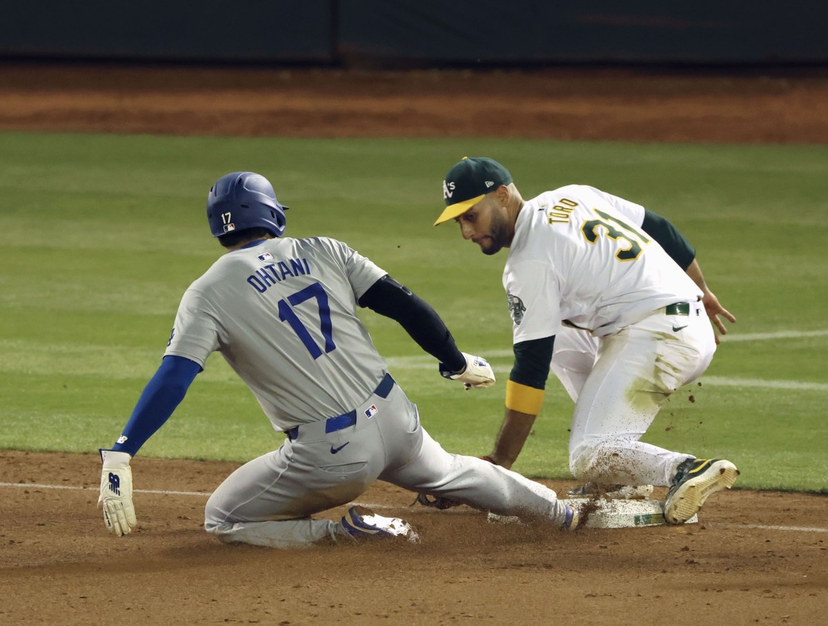 ９回、三盗で３１盗塁の大谷 米大リーグ・大谷 　アスレチックス戦の９回、三盗を決めるドジャース・大谷。自身初の１試合３盗塁で今季３１盗塁とした＝オークランド（共同）